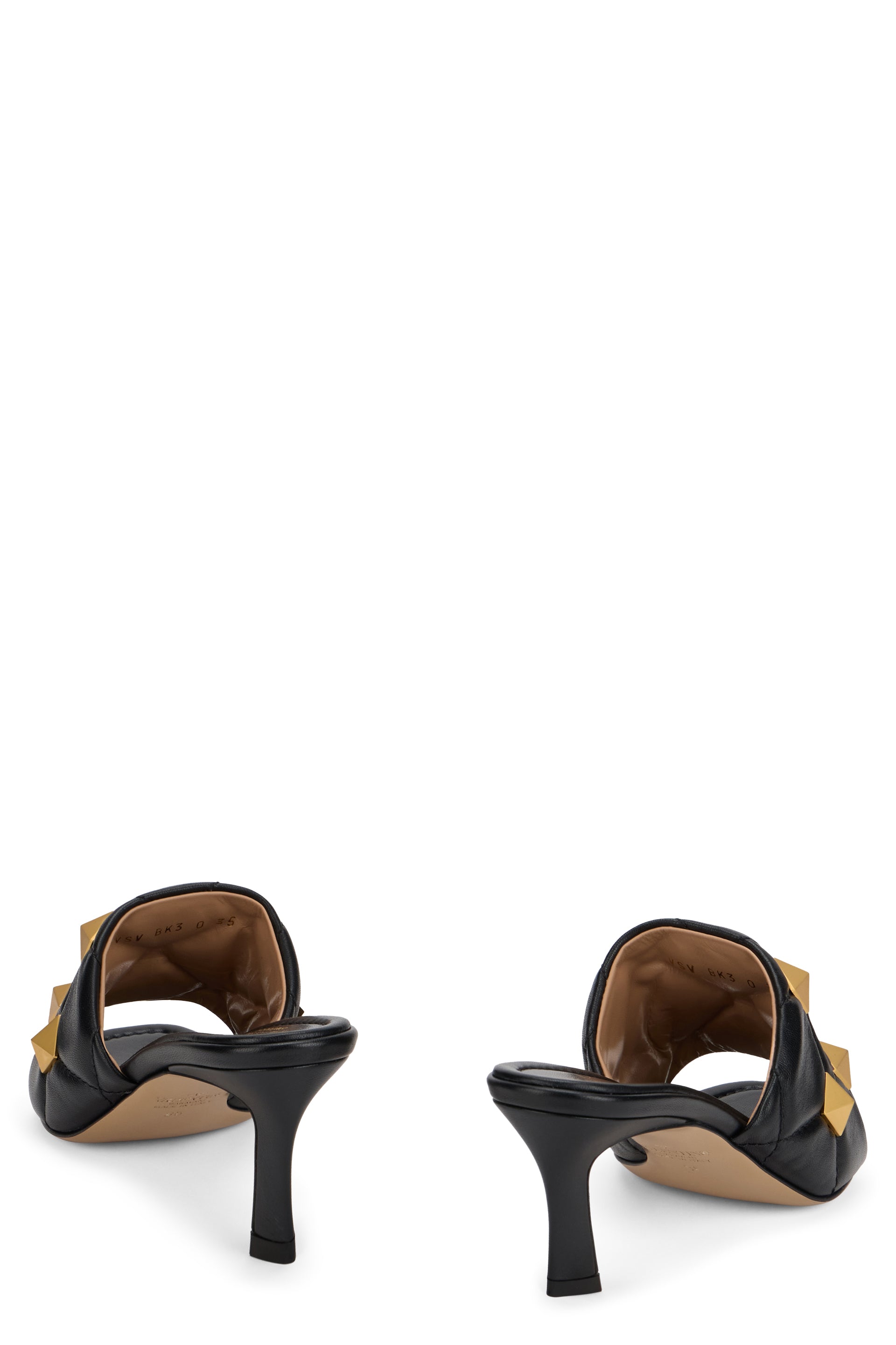 Elegant sandal with heel and decorative studs