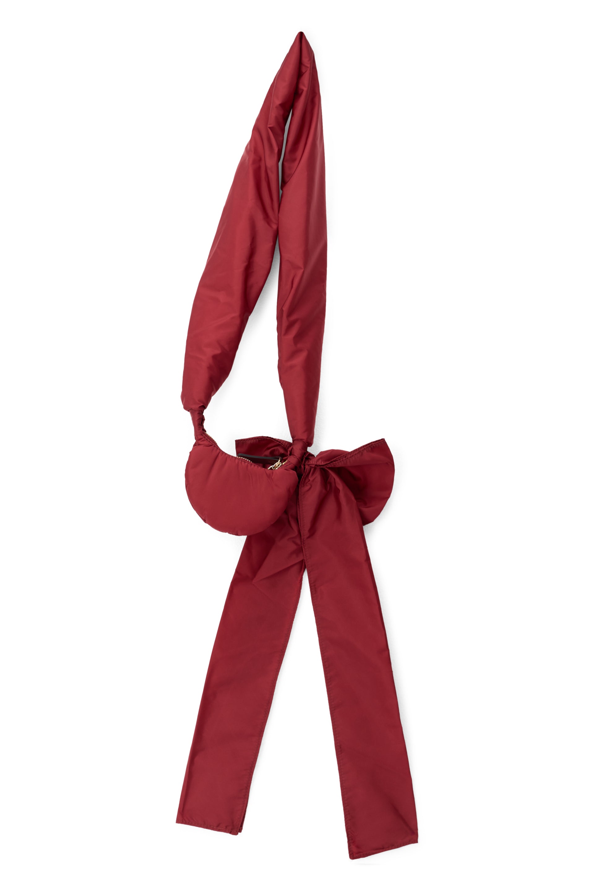 Elegant small shoulder bag in marsupial style in burgundy color.