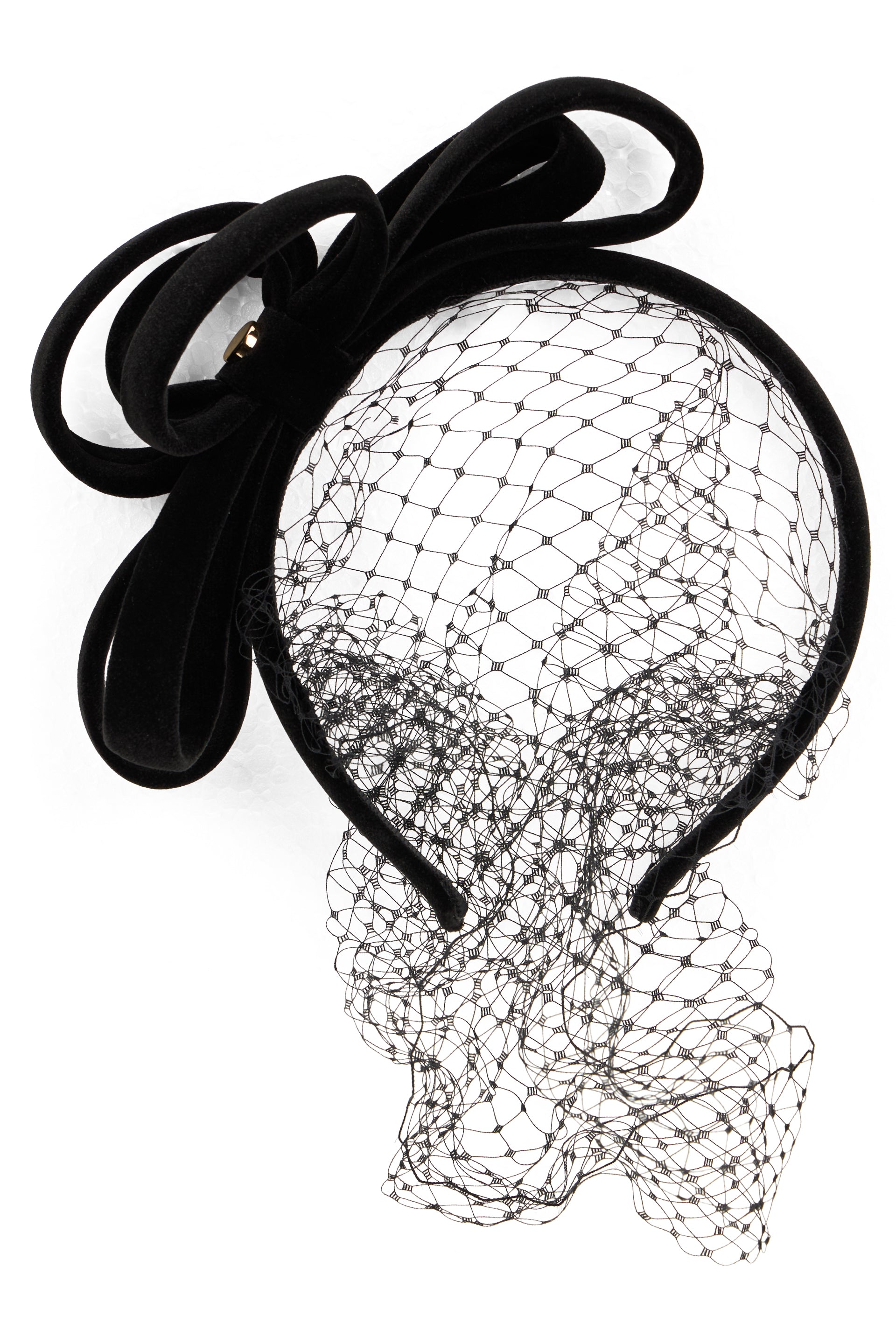 Elegant black hairband with bow, ideal for any occasion.