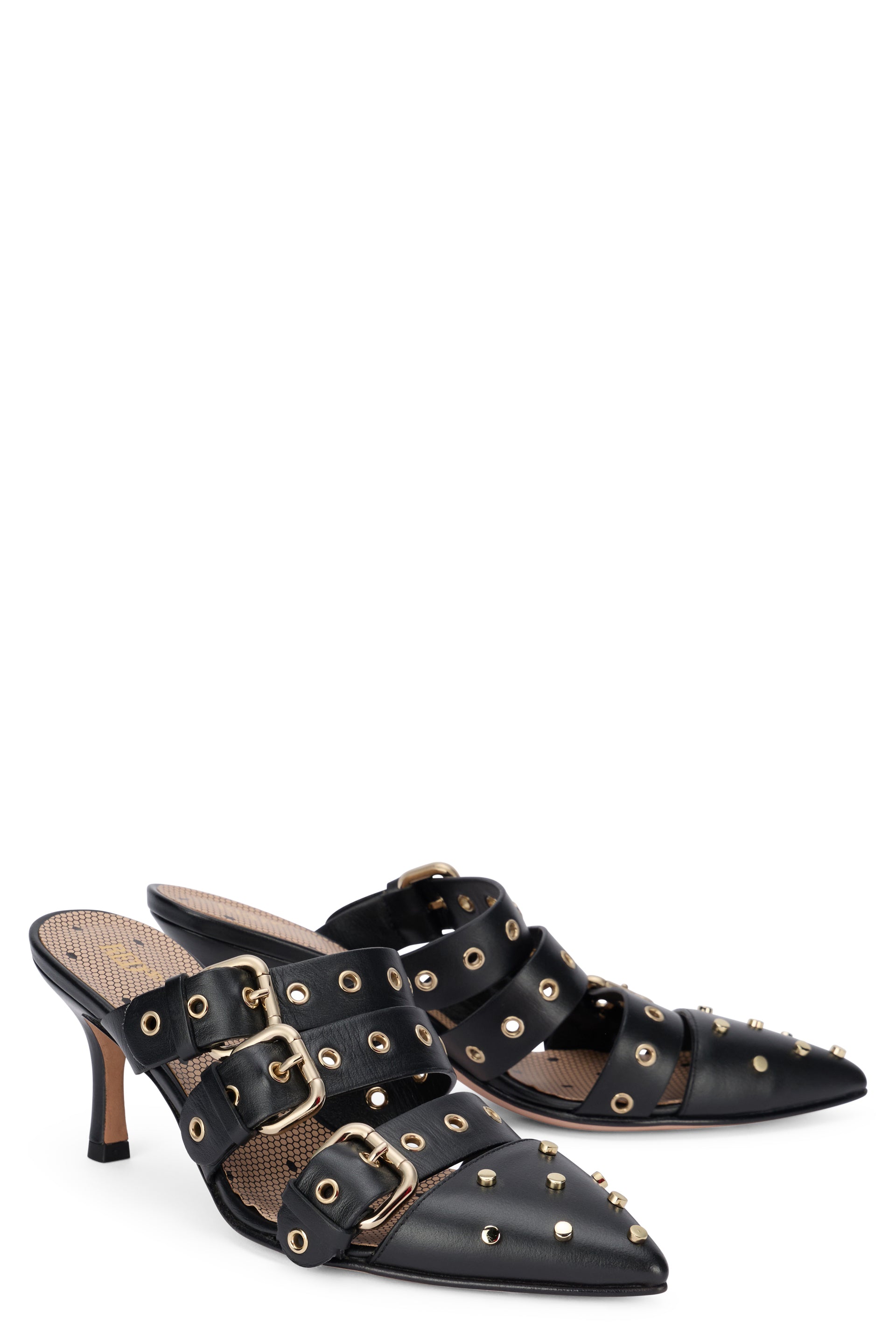 Elegant shoe with a medium heel and decorative buckles.