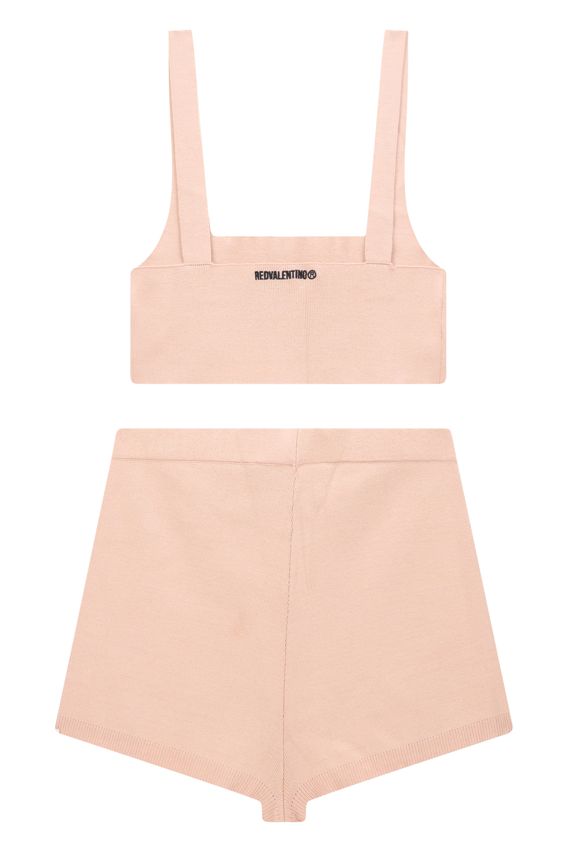 Set consisting of a top and micro shorts with a high waist in pale pink tones.