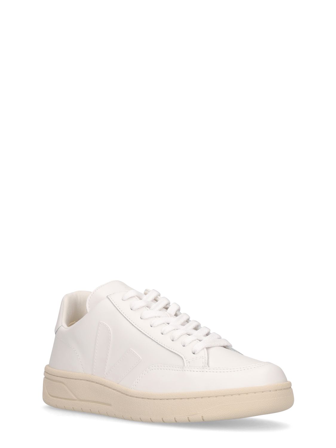 White sneakers with beige sole