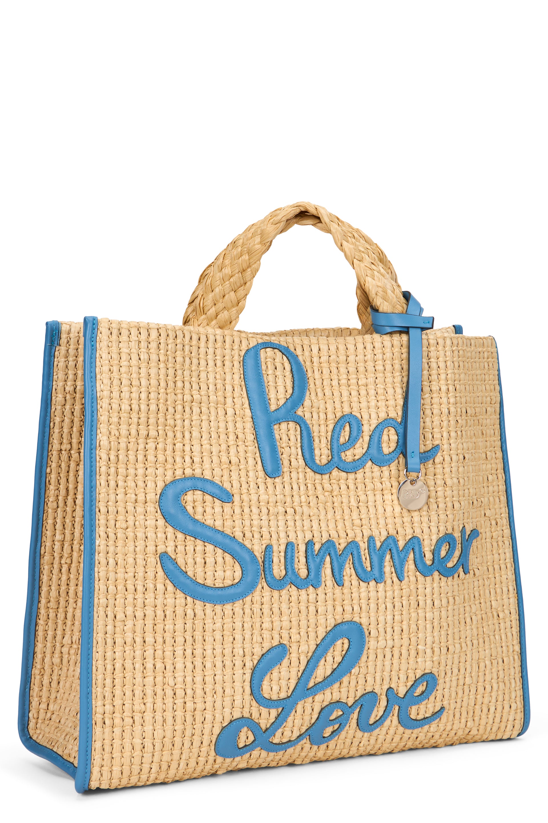 Straw bag with blue lettering in contrast.