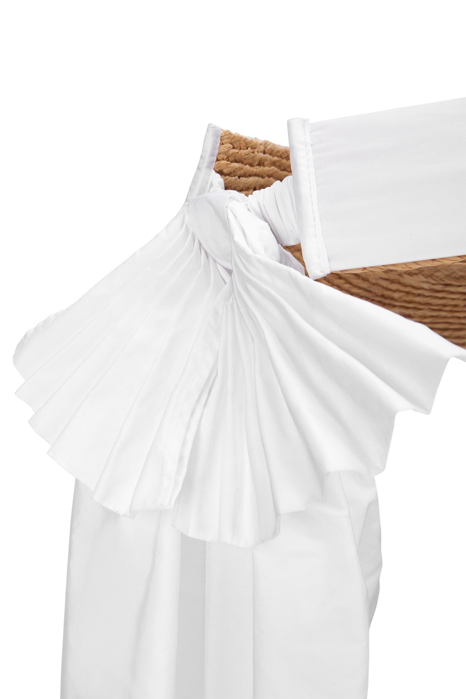 White bucket hat with ribbon, elegant and versatile.