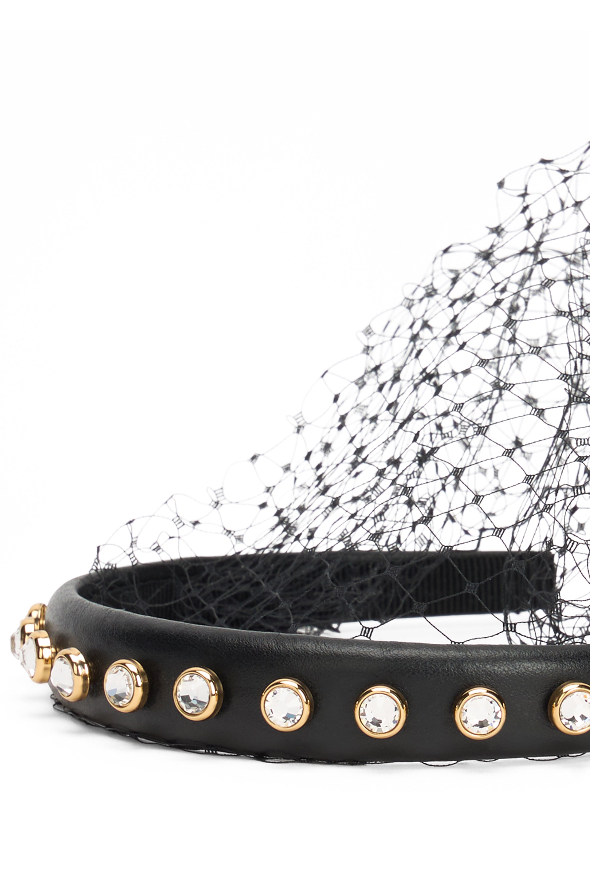 Black hairband with mesh in modern and sophisticated design.