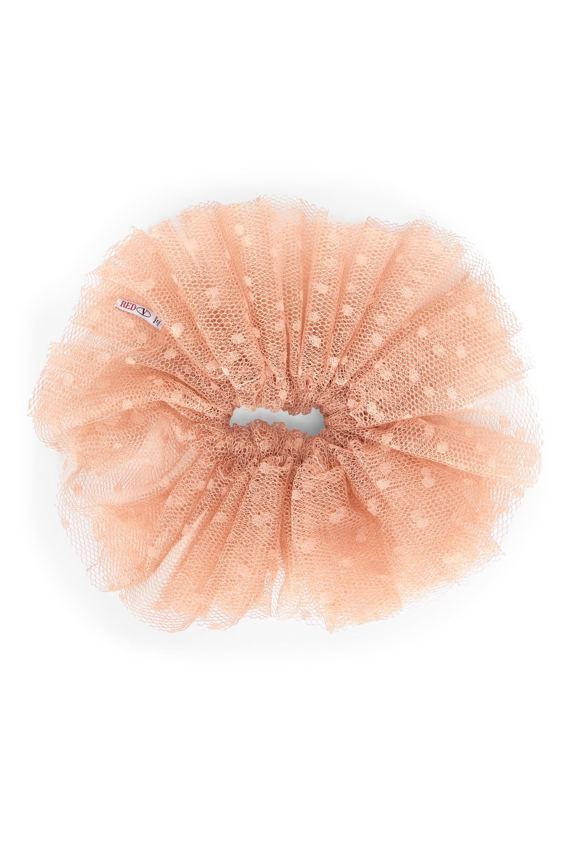 Pink salmon hairband with modern and refined design.