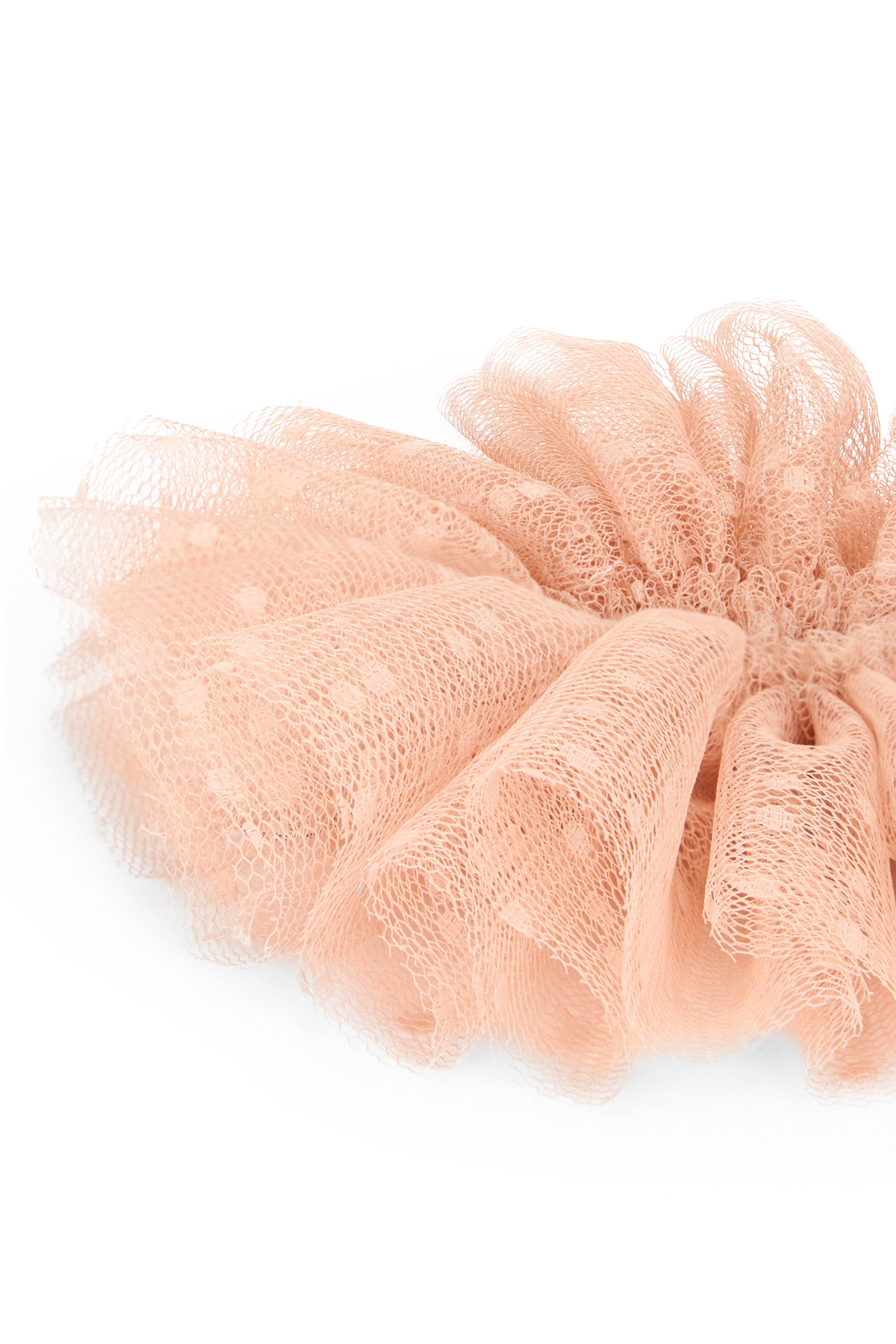 Pink salmon hairband with modern and refined design.