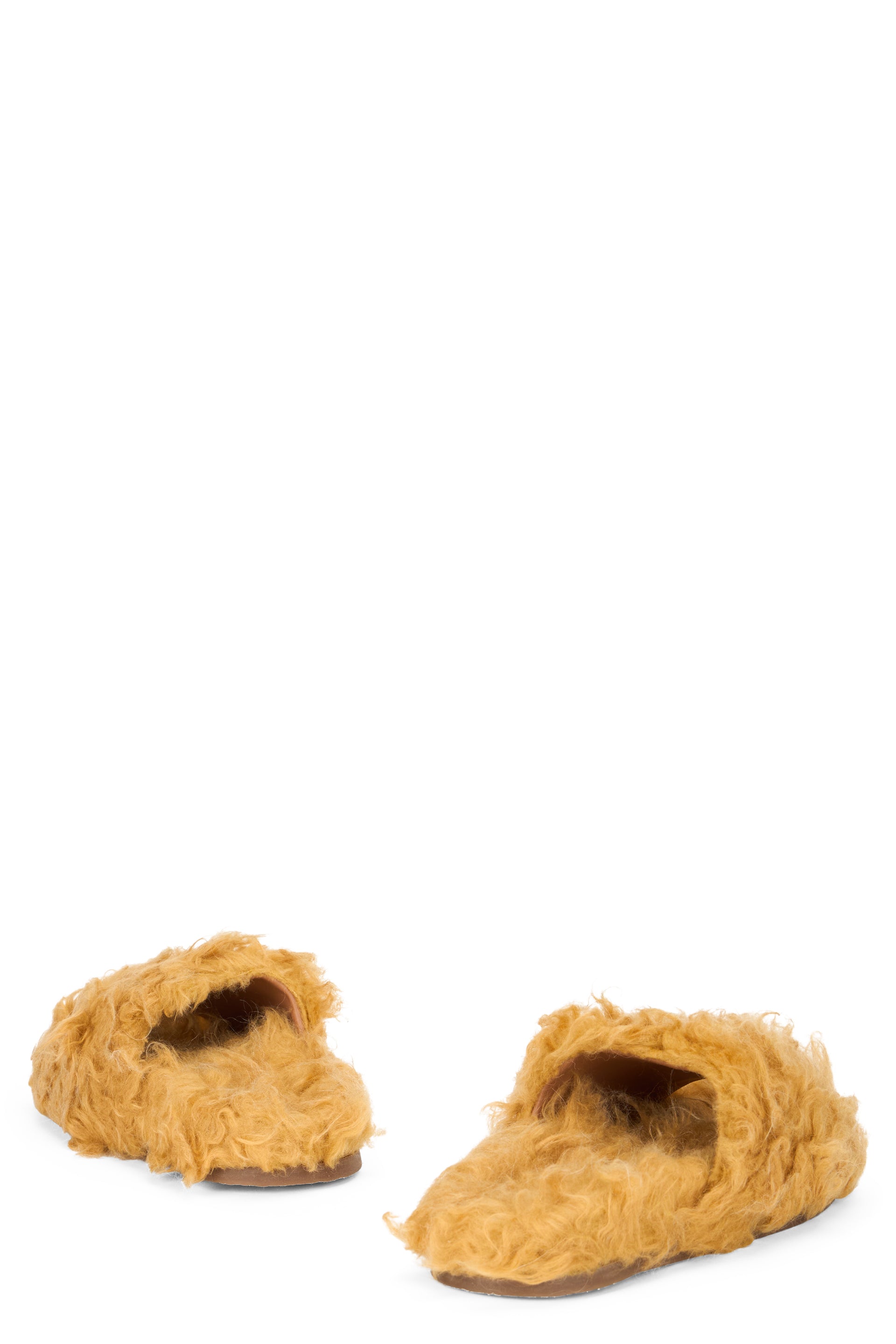 Yellow low sandals with a modern and comfortable design.