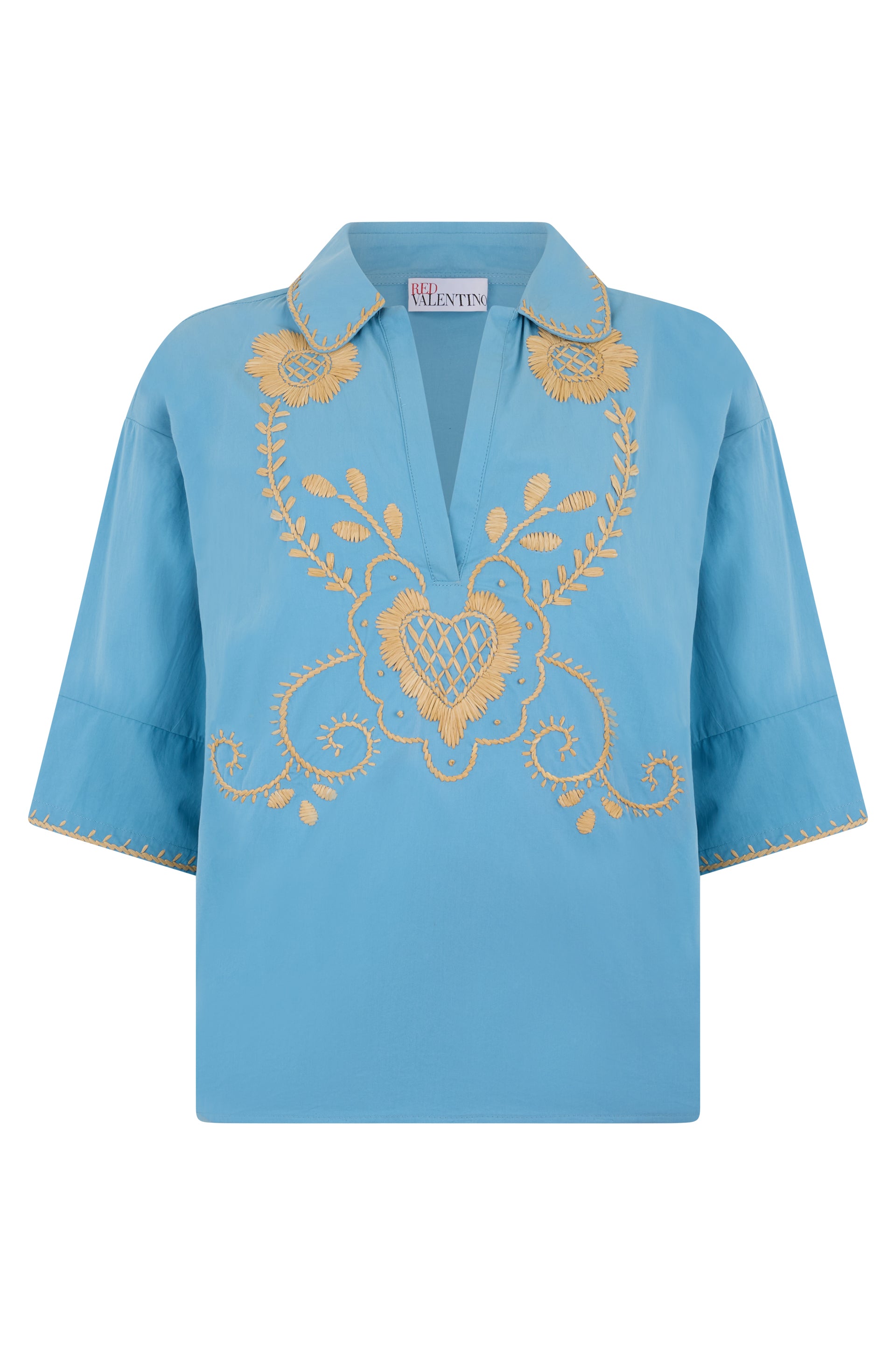 Blue blouse with short sleeves and beige insert.