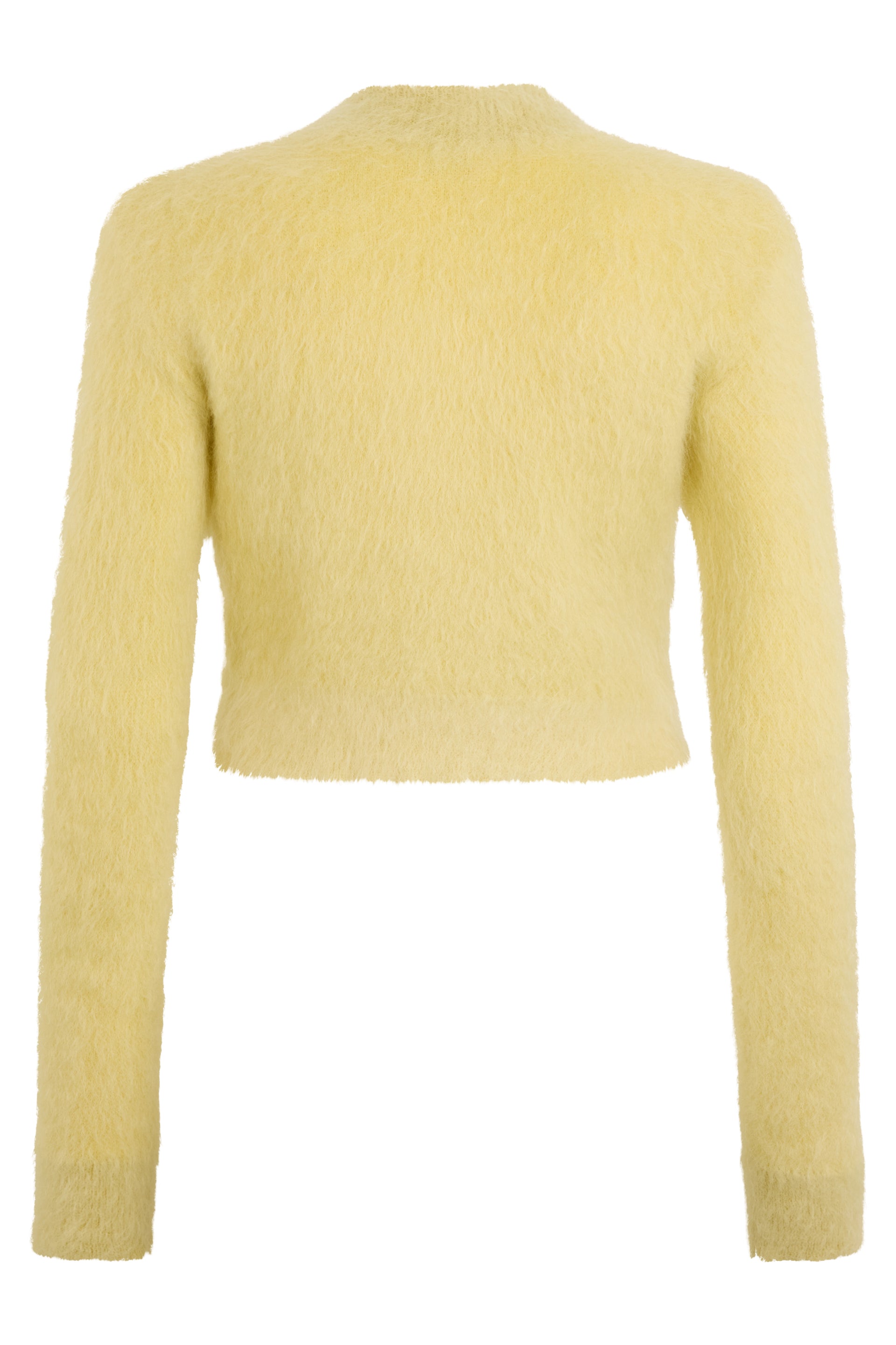 Yellow cropped jacket with elegant buttons.