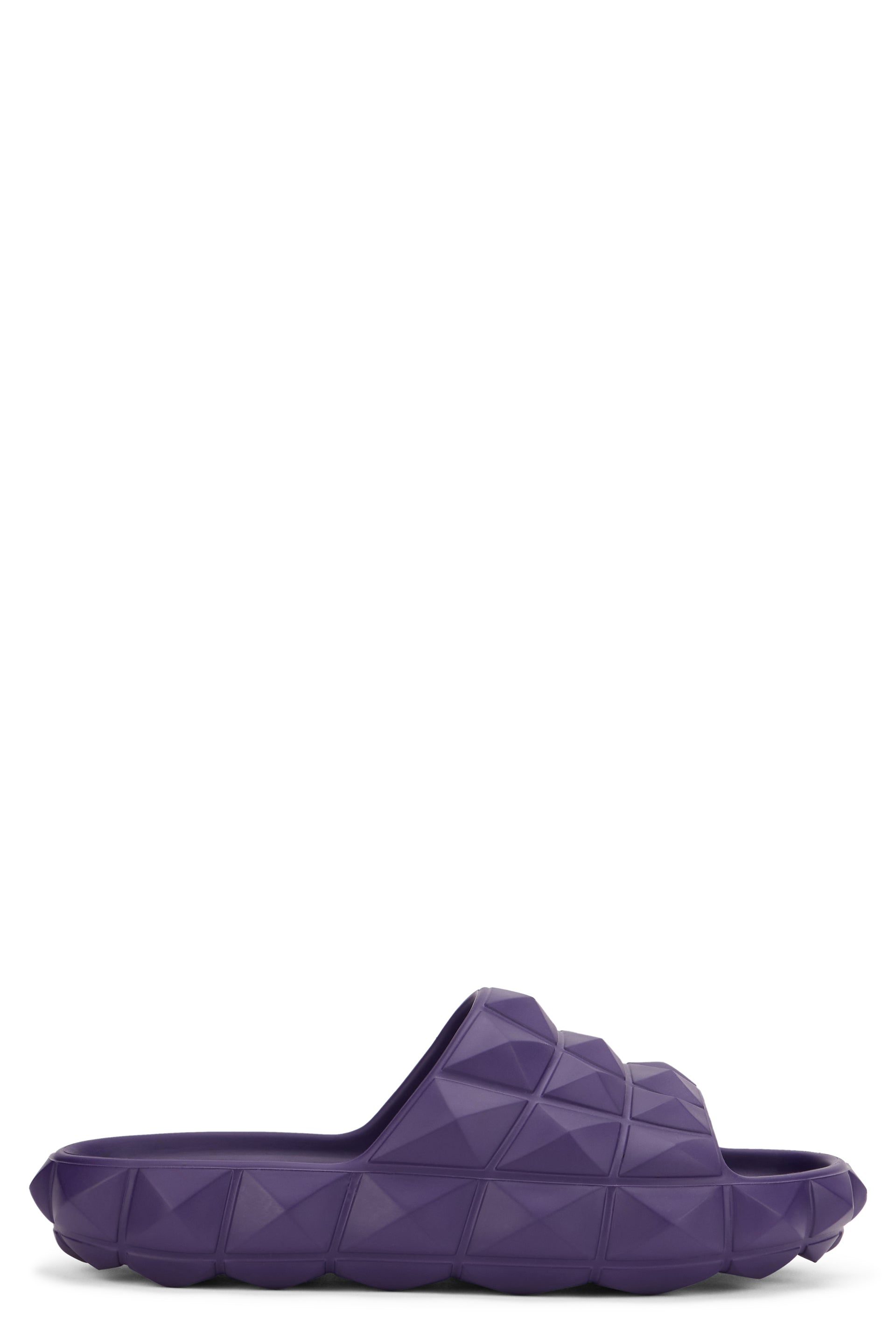 Purple slippers with a casual yet refined design.