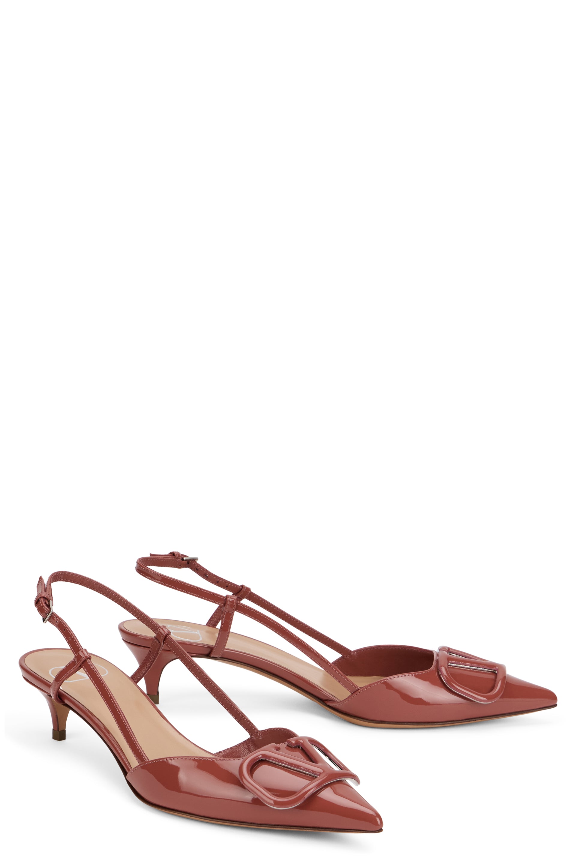 Elegant slingback shoe with low heel.