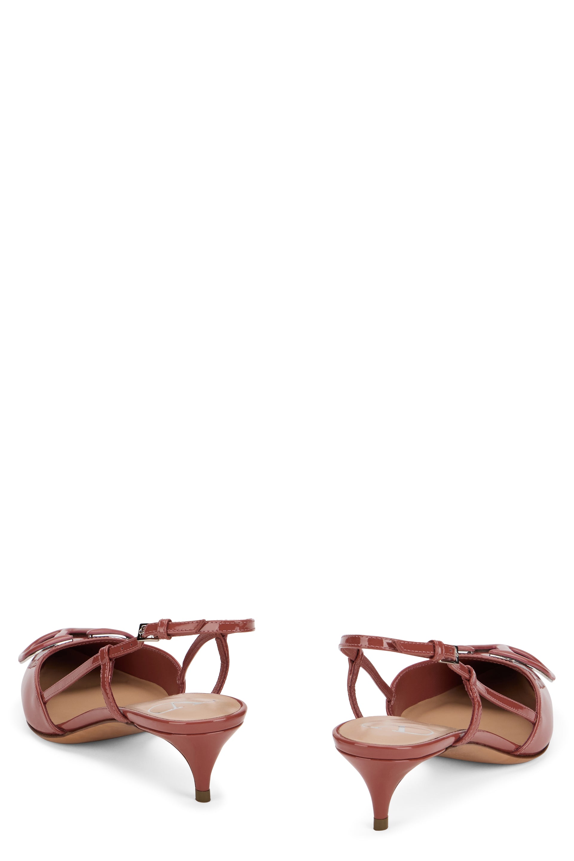 Elegant slingback shoe with low heel.