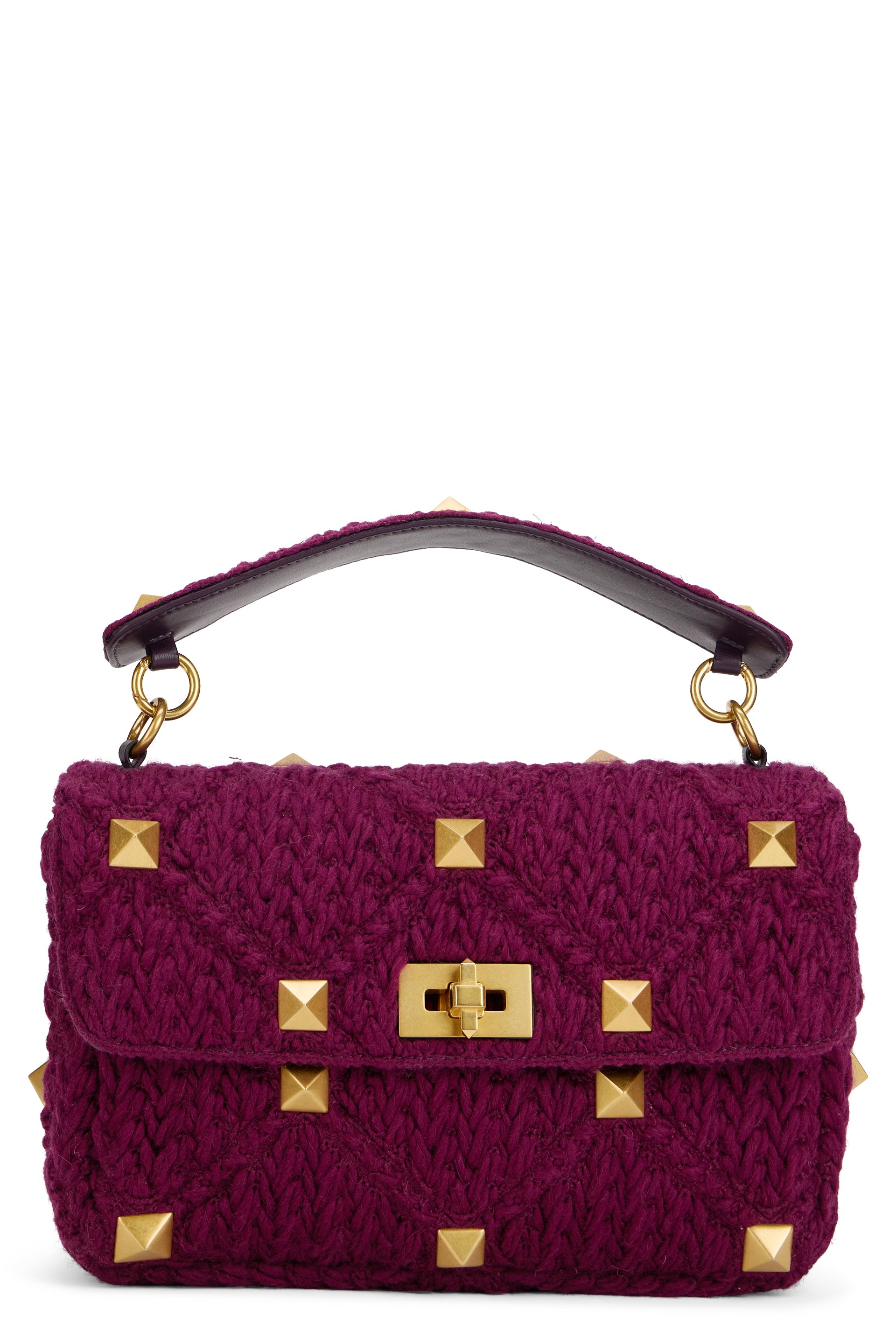 Elegant purple bag with golden details