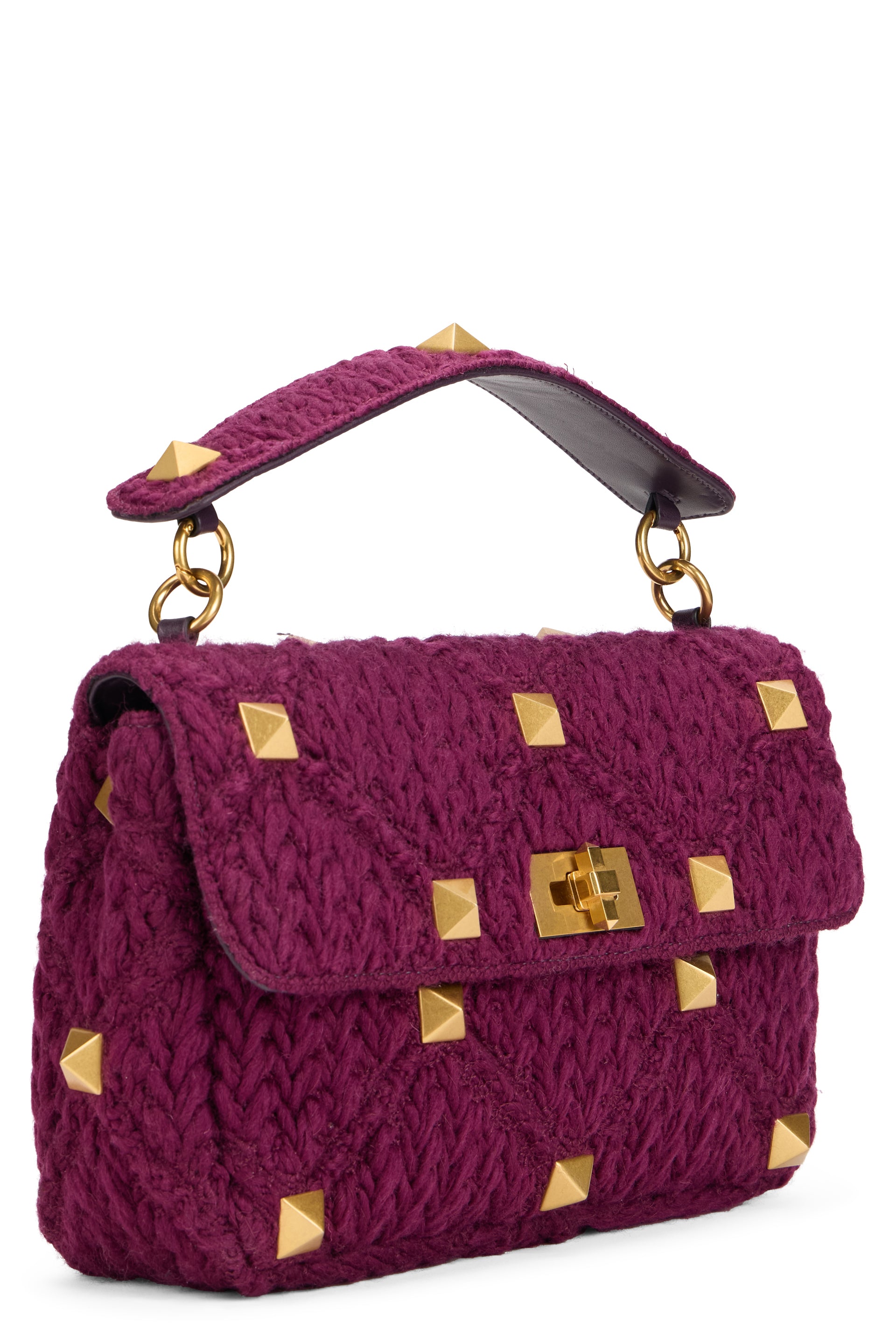 Elegant purple bag with golden details