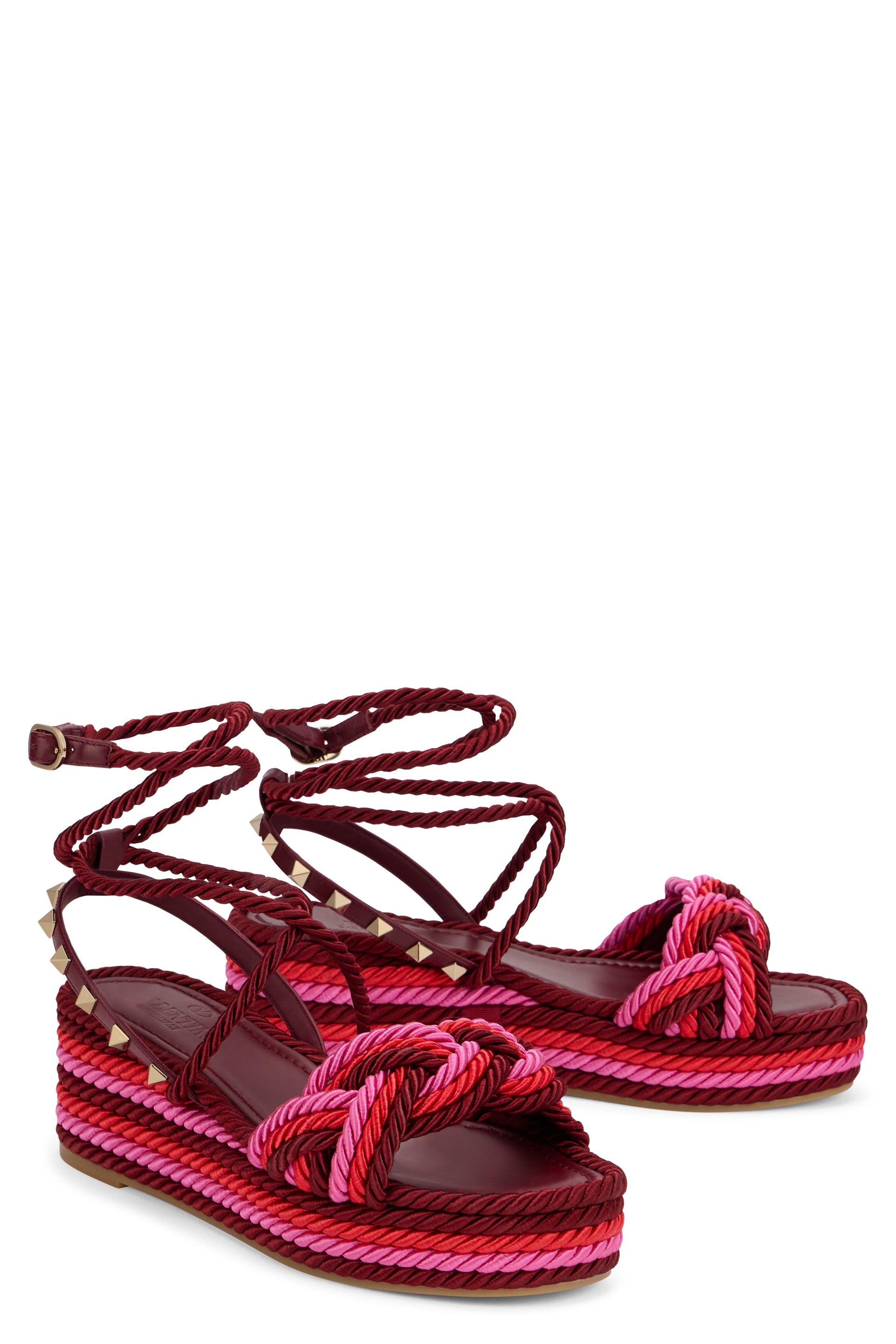 Elegant red wedge sandals.