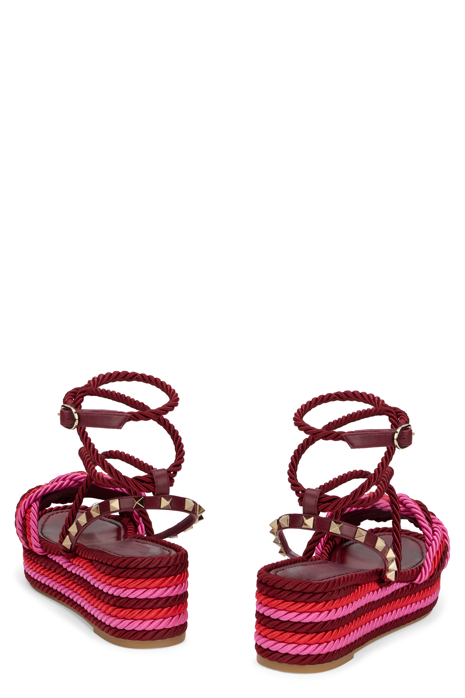 Elegant red wedge sandals.