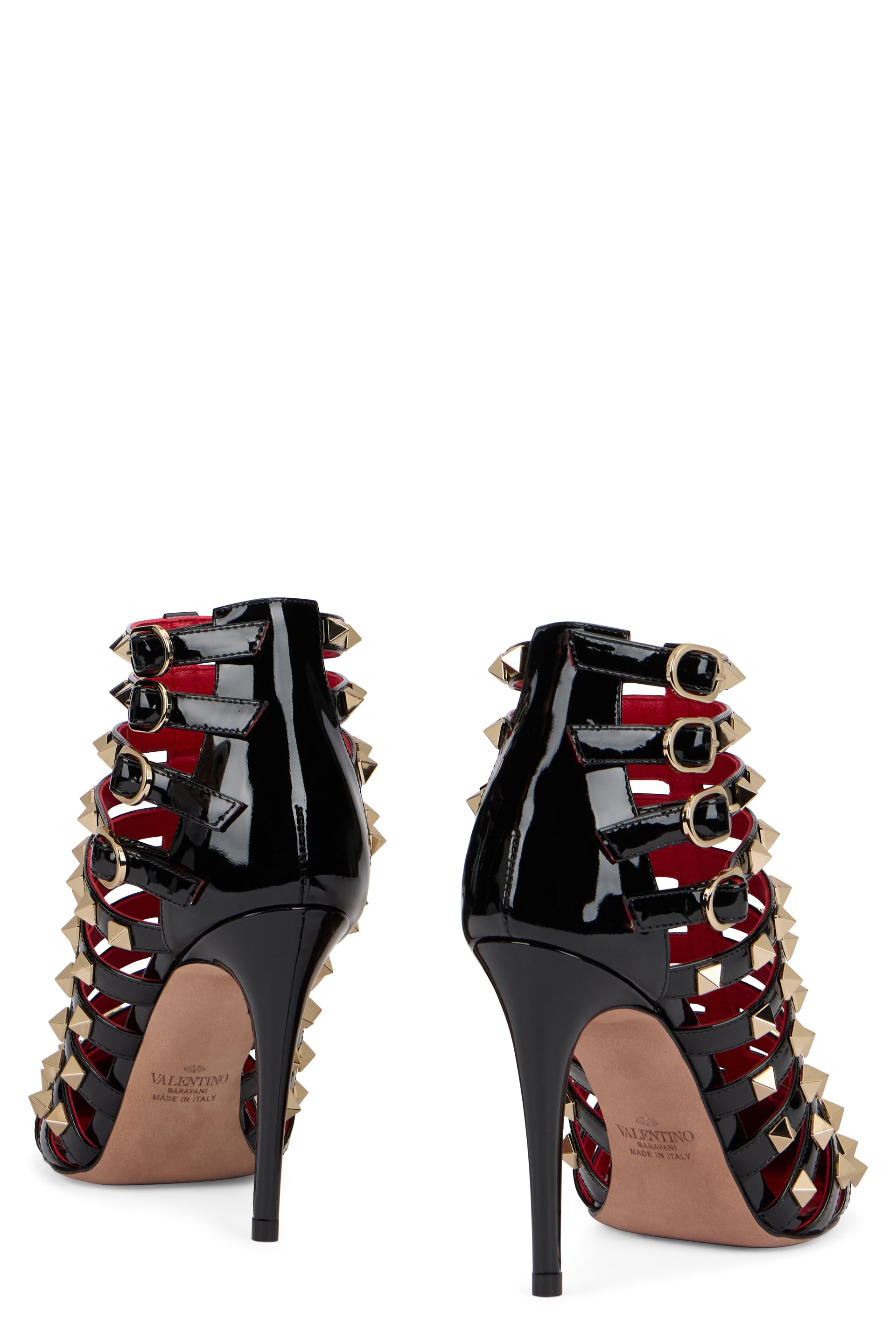 Elegant high-heeled shiny boots